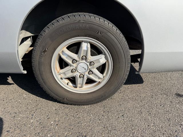 NV350キャラバンバン 2.0 DX ロングボディ 純正メモリーナビゲーション アルミホイール ブレーキサポート 禁煙 助手席エアバック メモリナビ 整備記録簿 キーレスリモコン パワーウインド ワンセグ ETC車載器 ドライブレコーダー AC エアバック PS ナビTV(48枚目)