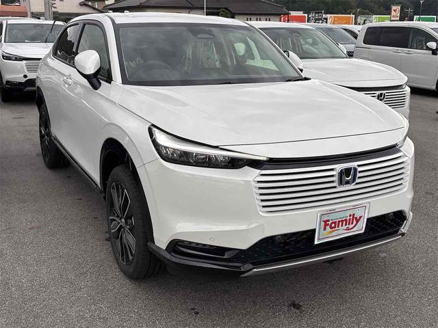 ヴェゼル ｅ：ＨＥＶ　Ｚ　登録済み未使用車　バックカメラ　クリアランスソナー　オートクルーズコントロール　レーンアシスト　衝突被害軽減システム　オートライト　ＬＥＤヘッドランプ　電動リアゲート　アルミホイール　スマートキー（19枚目）