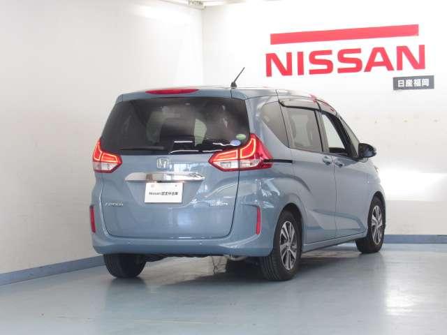 フリードハイブリッド 1.5 ハイブリッド G ホンダセンシング ナビ/バックモニタ-/ドラレコ前後/ETC/両側 NAVI 軽減ブレーキ キーフリーシステム 記録簿 ECON メモリーナビ 後カメラ Aクルーズ LEDヘッドランプ パワーウインドウ ETC付 両席エアバック エアバッグ パワステ オートエアコン(2枚目)