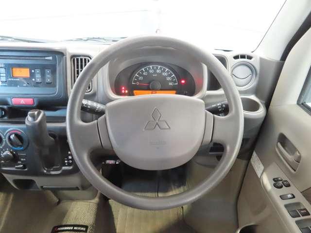 ミニキャブバン ブラボー フルフラット 4WD エアコン パワーウインドウ 寒冷地仕様 ABS リモコンキー 助手席エアバッグ 運転席エアバッグ パワステ 両側スライドドア(12枚目)