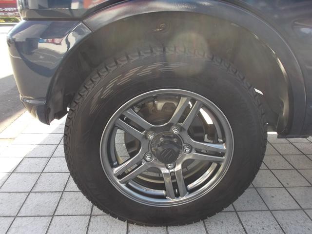 ジムニー ＸＣ　タ－ボ　パ－トタイム４ＷＤ　５速マニュアル車　ランドベンチャー用１６インチアルミホイ－ル＆スタッドレスタイヤ装着済み　フォグランプ　ル－フレ－ル　電動格納ドアミラ－　ＡＢＳ　プライバシ－ガラス☆（72枚目）