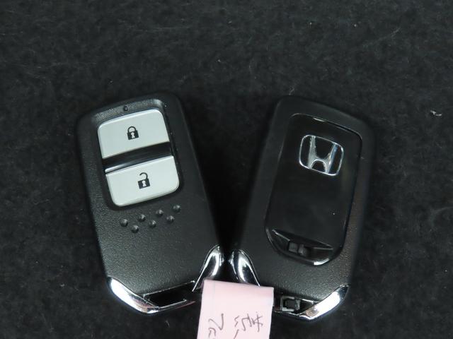 フィット １３Ｇ・Ｆパッケージ／バックカメラ付きナビ・ＥＴＣ付き車　前ドラレコ　バックカメラ　オートライト　Ｂｌｕｅｔｏｏｔｈ　プッシュスタート　オートエアコン　ＥＴＣ　ワンオーナー　アイドリングストップ　横滑り防止機能　衝突安全ボディ　盗難防止システム（50枚目）