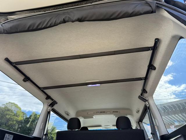 ハイエースバン ロングワイドスーパーＧＬ　４ＷＤ　ワンオーナー　両側パワースライドドア　スマートキー　ＬＥＤヘッドライト　リフトアップ　大径タイヤ新品付き　ダブルモニター　ナビ　後席モニター　社外スピーカー　フルセグテレビ　トランク２段棚付き（28枚目）