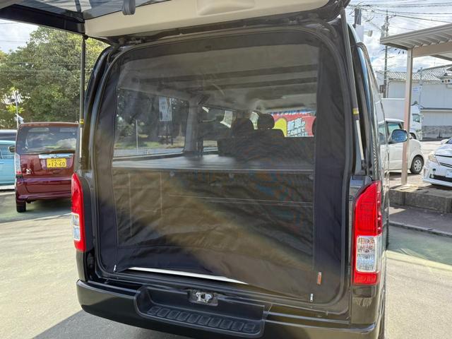 ハイエースバン ロングワイドスーパーＧＬ　４ＷＤ　ワンオーナー　両側パワースライドドア　スマートキー　ＬＥＤヘッドライト　リフトアップ　大径タイヤ新品付き　ダブルモニター　ナビ　後席モニター　社外スピーカー　フルセグテレビ　トランク２段棚付き（29枚目）