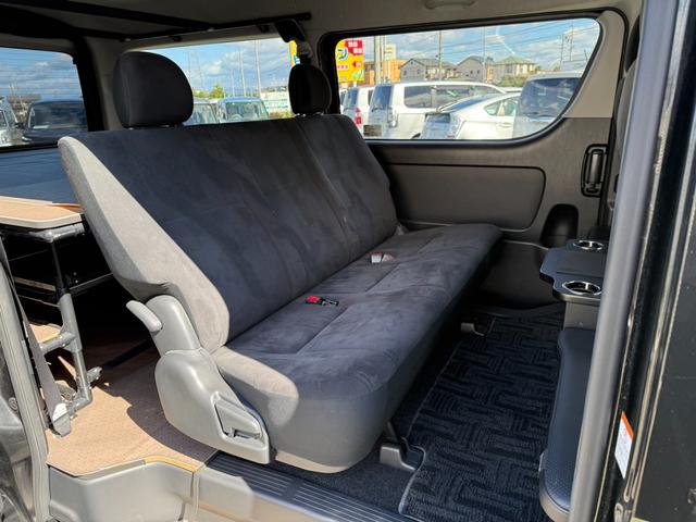 ハイエースバン ロングワイドスーパーＧＬ　４ＷＤ　ワンオーナー　両側パワースライドドア　スマートキー　ＬＥＤヘッドライト　リフトアップ　大径タイヤ新品付き　ダブルモニター　ナビ　後席モニター　社外スピーカー　フルセグテレビ　トランク２段棚付き（31枚目）