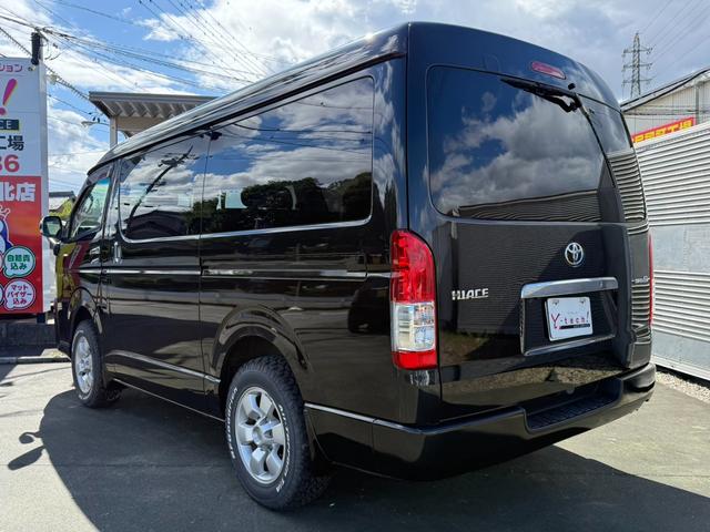 ハイエースバン ロングワイドスーパーＧＬ　４ＷＤ　ワンオーナー　両側パワースライドドア　スマートキー　ＬＥＤヘッドライト　リフトアップ　大径タイヤ新品付き　ダブルモニター　ナビ　後席モニター　社外スピーカー　フルセグテレビ　トランク２段棚付き（35枚目）