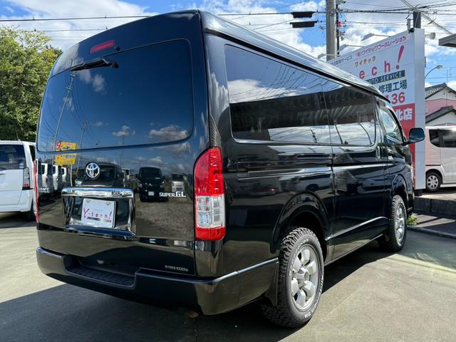 ハイエースバン ロングワイドスーパーＧＬ　４ＷＤ　ワンオーナー　両側パワースライドドア　スマートキー　ＬＥＤヘッドライト　リフトアップ　大径タイヤ新品付き　ダブルモニター　ナビ　後席モニター　社外スピーカー　フルセグテレビ　トランク２段棚付き（36枚目）