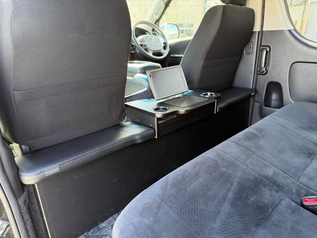 ハイエースバン ロングワイドスーパーＧＬ　４ＷＤ　ワンオーナー　両側パワースライドドア　スマートキー　ＬＥＤヘッドライト　リフトアップ　大径タイヤ新品付き　ダブルモニター　ナビ　後席モニター　社外スピーカー　フルセグテレビ　トランク２段棚付き（57枚目）