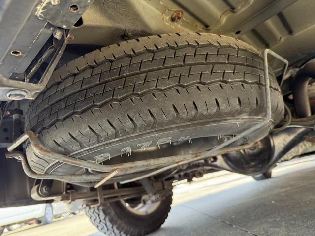 ハイエースバン ロングワイドスーパーＧＬ　４ＷＤ　ワンオーナー　両側パワースライドドア　スマートキー　ＬＥＤヘッドライト　リフトアップ　大径タイヤ新品付き　ダブルモニター　ナビ　後席モニター　社外スピーカー　フルセグテレビ　トランク２段棚付き（75枚目）
