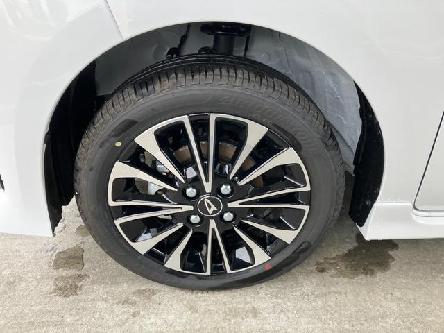 タント カスタムRS 4WD 純正10インチナビ パノラマモニター スマートアシスト・LEDヘッドライト・15インチアルミホイール・両側パワースライドドア・USBソケット・運転席助手席シートヒーター・レザー調Xフルファブリックシート・本革巻ステアリングホイール(25枚目)