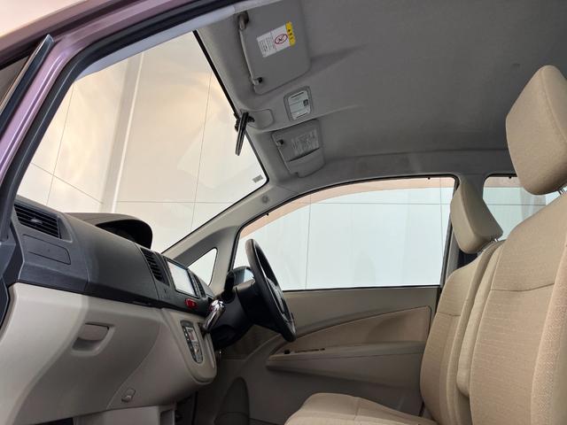 ムーヴ Ｘリミテッド　ナビ／ＥＴＣ／アルミ　純正ナビ　バックモニター　ハロゲンヘッドライト　純正１４インチアルミホイール　スマートキー　電動格納ミラー　取扱説明書　メンテナンスノート（12枚目）