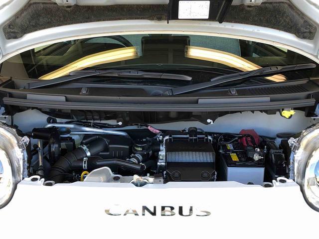 ムーヴキャンバス ストライプスＧターボ　２ＷＤ　ターボ　　両側電動スライドドア　オートライト　衝突被害軽減システム　横滑り防止機能　プッシュスタート　スマートキー　オートエアコン　電動格納ドアミラー　アイドリングストップ　ＡＢＳ　新品ナビ（19枚目）