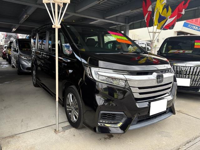 ステップワゴンスパーダ スパーダハイブリッド　Ｇ・ＥＸ　ホンダセンシング　ナビ　ＴＶ　ＤＶＤ　Ｂｌｕｅｔｏｏｔｈ　バックカメラ　衝突軽減ブレーキ　両側電動スライドドア　後席モニター