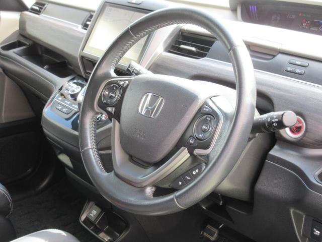 フリードハイブリッド ハイブリッド・ＥＸ　ホンダセンシング　６人乗り　スマートキー　ＰＵＳＨスタート　両側パワースライドドア　純正９ｉｎｃメモリーナビ　後席用フリップダウンモニター　フルセグＴＶ　バックカメラ　スマホ接続対応（8枚目）