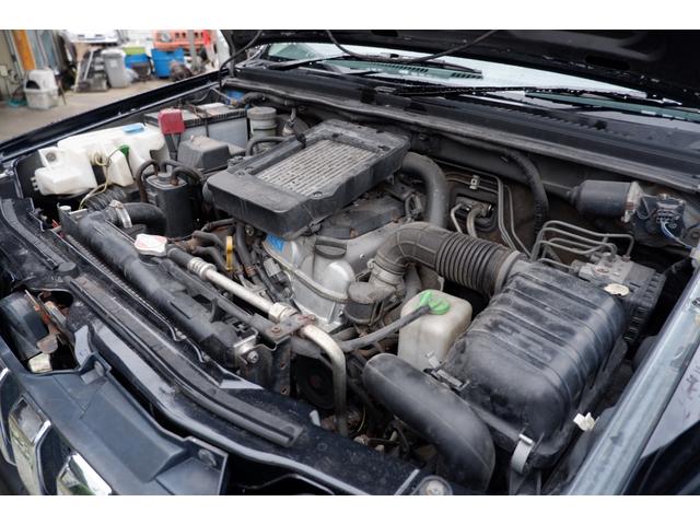 ジムニー ワイルドウインド　クロスアドベンチャーホイール・グリル・社外ヘッドライト・社外マフラー・リビルドエンジン（25枚目）