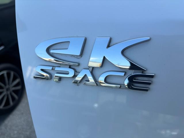 ｅＫスペースカスタム カスタムＧ　ｅ－アシスト　社外ＤＶＤナビ　Ｂｌｕｅｔｏｏｔｈオーディオ　ＴＶフルセグ　バックカメラルームミラー反映タイプ　ベンチシート　スマートキー　リアサーキュレーター　ステアリングスイッチ　両側パワースライドドア（61枚目）