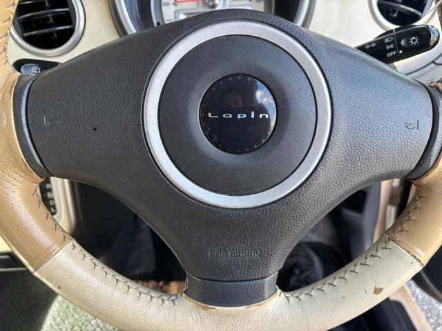 アルトラパン Ｘ　純正ＣＤオーディオ　ベンチシート　プッシュスタート　スマートキー２個　電動格納ミラー　ライトレベライザー　取説　ウィンカーミラー　ホワイトルーフ　サイドスカート　純正アルミ（20枚目）