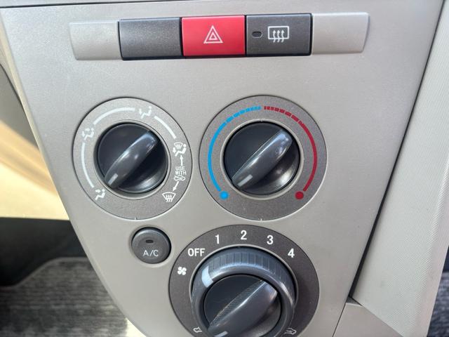 ミラ Ｘスペシャル　５速ＭＴマニュアル車　社外ＳＤナビ　Ｂｌｕｅｔｏｏｔｈオーディオ　手動サイドミラー　ライトレベライザー　キーレスキー　取説　車外アルミ　新品タイヤ４本交換済　ローダウン　社外エアクリーナー（21枚目）