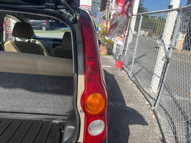 ミラ Ｘスペシャル　５速ＭＴマニュアル車　社外ＳＤナビ　Ｂｌｕｅｔｏｏｔｈオーディオ　手動サイドミラー　ライトレベライザー　キーレスキー　取説　車外アルミ　新品タイヤ４本交換済　ローダウン　社外エアクリーナー（39枚目）