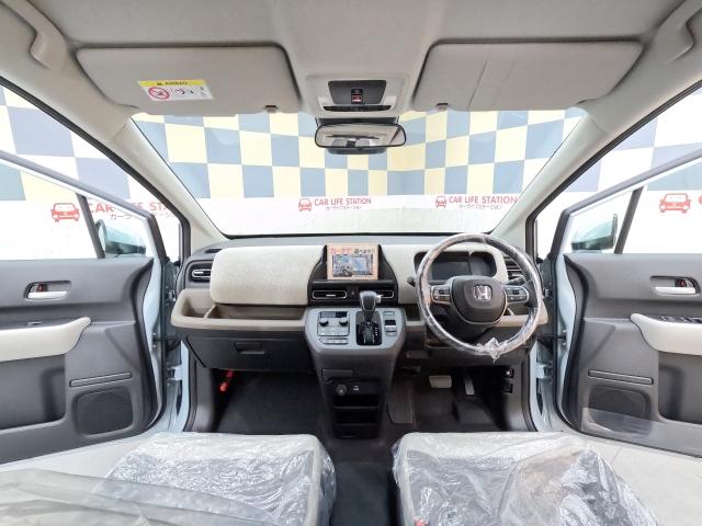 フリード ｅ：ＨＥＶエアー　ＥＸ　登録済未使用車（8枚目）