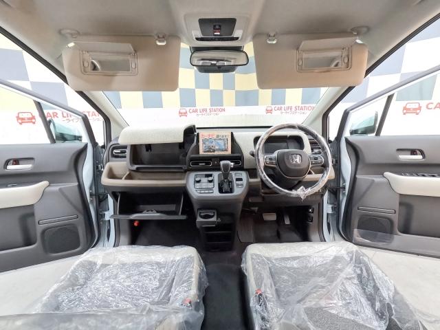 フリード ｅ：ＨＥＶエアー　ＥＸ　登録済未使用車（9枚目）