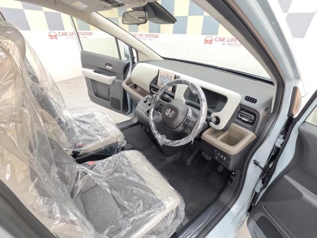 フリード ｅ：ＨＥＶエアー　ＥＸ　登録済未使用車（57枚目）