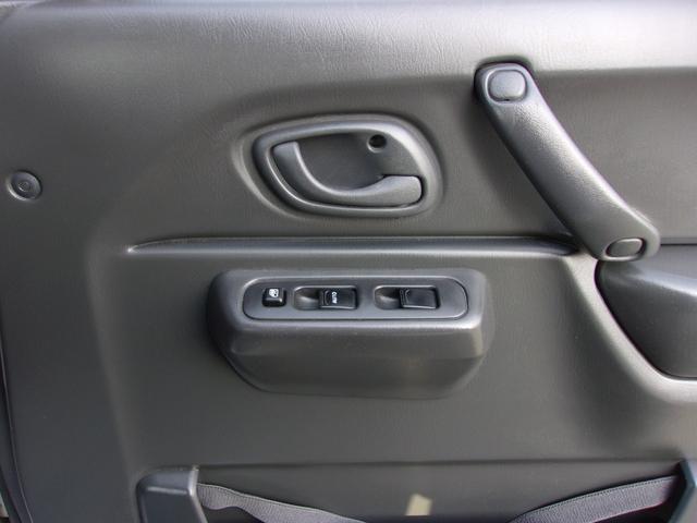 ジムニー ＸＧ　切替４ＷＤ　５速ＭＴ　ターボ　ＣＤステレオ　ライトレベライザー（18枚目）