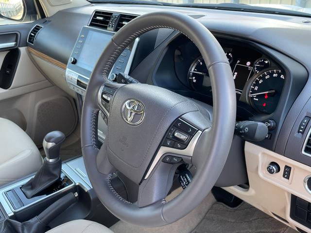 ランドクルーザープラド TX Lパッケージ マットブラックエディション ワンオーナー 純正ナビ フルセグTV ETC2.0 全方位モニター ムーンルーフ TRDエアロ 専用グリル・アルミ オートライト シートベンチレーター 追従クルーズコントロール 衝突被害軽減ブレーキ(22枚目)