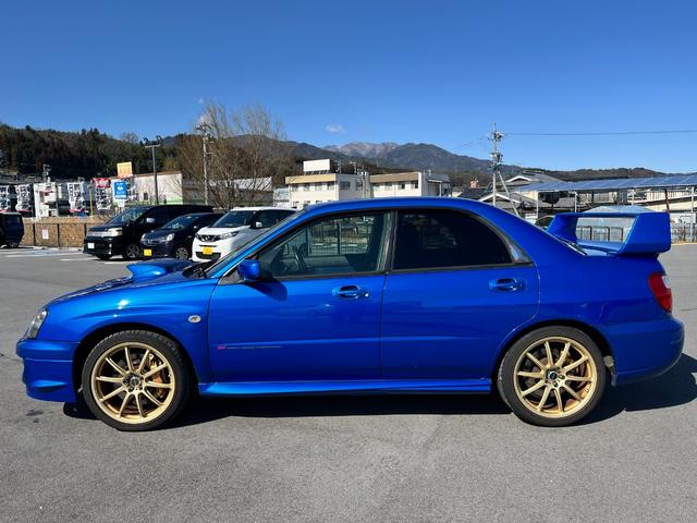 インプレッサ ＷＲＸ　ＳＴｉ　キーレス　フルセグ　ナビ＆ＴＶ　１８アルミホイール　エアバッグ　ディーラー車　フル装備　ＨＩＤヘッドライト　ＥＴＣ　純正フォグランプ　純正ホイール付きスタッドレス　純正ラバーマット　当店買取車両（5枚目）