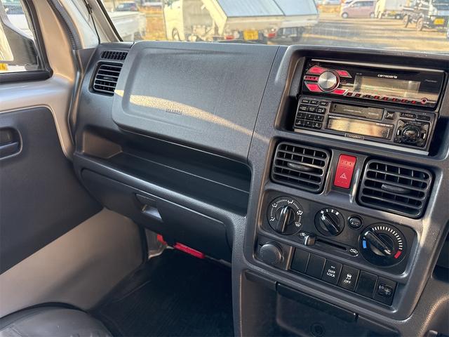 キャリイトラック KCエアコン・パワステ エアコン パワステ 切り替え4WD デフロック 4枚リーフスプリング CD 横滑り防止 運転席エアバック 助手席側エアバック 車検令和9年 走行18619KM 5速マニュアル(32枚目)