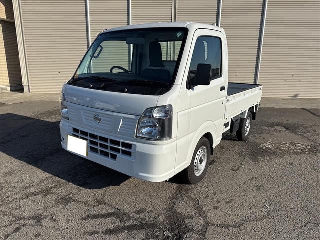 NT100クリッパートラック DX農繁仕様 エアコン パワステ 切り替え4WD 4枚リーフスプリング デフロック 横滑り防止 ABS オートライト 荷台ランプ 純正マット 荷台マット 走行51KM 車検令和8年6月(2枚目)