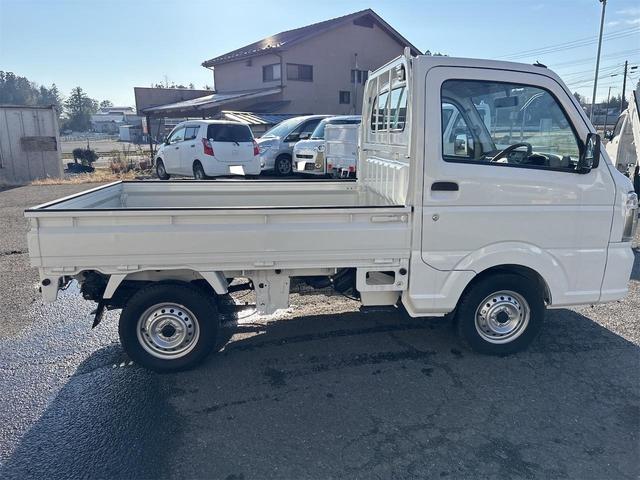 NT100クリッパートラック DX農繁仕様 エアコン パワステ 切り替え4WD 4枚リーフスプリング デフロック 横滑り防止 ABS オートライト 荷台ランプ 純正マット 荷台マット 走行51KM 車検令和8年6月(7枚目)