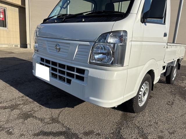 NT100クリッパートラック DX農繁仕様 エアコン パワステ 切り替え4WD 4枚リーフスプリング デフロック 横滑り防止 ABS オートライト 荷台ランプ 純正マット 荷台マット 走行51KM 車検令和8年6月(10枚目)