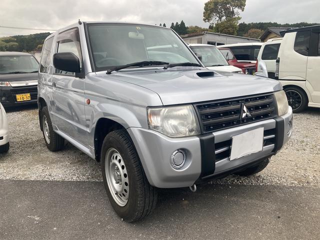 パジェロミニ ＺＲ　４ＷＤ　ナビ　ＡＴ　盗難防止システム　ＡＢＳ　ＣＤ　ＤＶＤ再生　衝突安全ボディ　エアコン　修復歴無し　運転席エアバック　助手席エアバック　ヘッドライトレベライザー　背面タイヤ（14枚目）