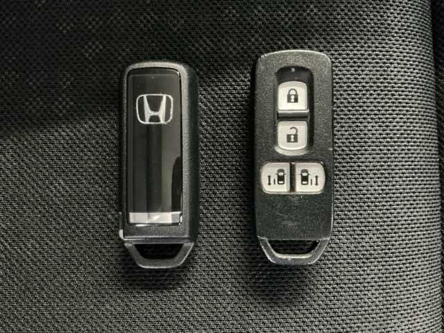 N-BOXカスタム GターボSSブラックスタイルパッケージ ホンダ認定中古車 社外ドラレコ 両側電動 カーテンエアバック 整備記録簿 ナビTV バックモニター 地デジTV 前席シートヒーター 盗難防止システム 横滑り防止 ワンオーナー DVD キーレス ターボ(18枚目)