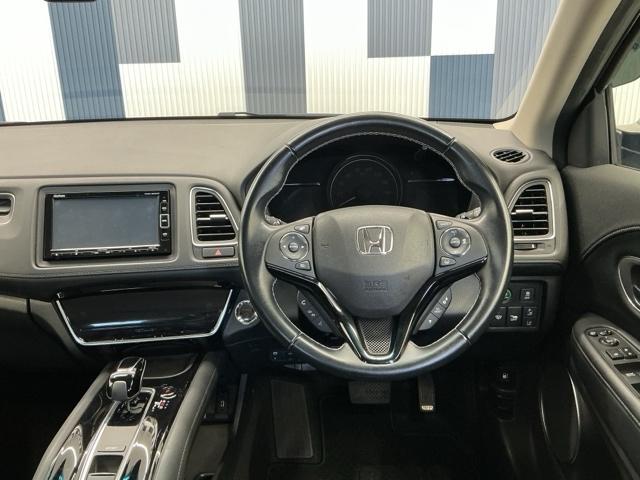 ヴェゼル ハイブリッドZ・ホンダセンシング ホンダ認定中古車 社外ドラレコ前後 レーダーサポート Wエアコン DVD再生機能 整備記録簿 横滑り防止システム バックアイカメラ 盗難防止装置 フルセ シートヒーター付 スマ-トキ- ECOモード(18枚目)