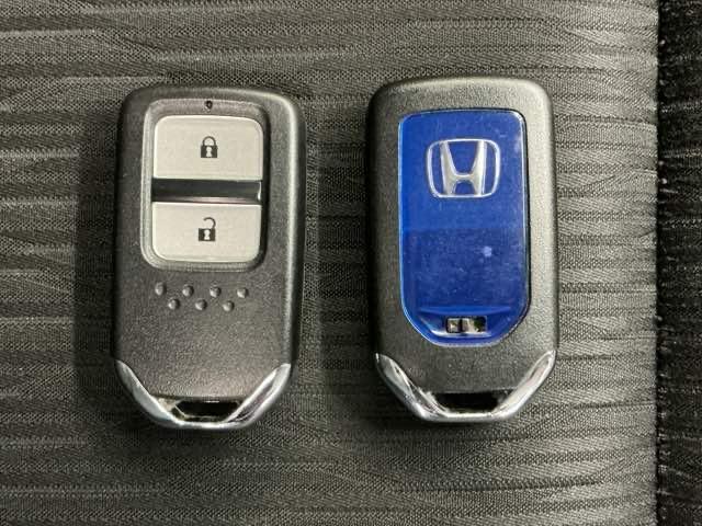 ヴェゼル ハイブリッドZ・ホンダセンシング ホンダ認定中古車 社外ドラレコ前後 レーダーサポート Wエアコン DVD再生機能 整備記録簿 横滑り防止システム バックアイカメラ 盗難防止装置 フルセ シートヒーター付 スマ-トキ- ECOモード(19枚目)