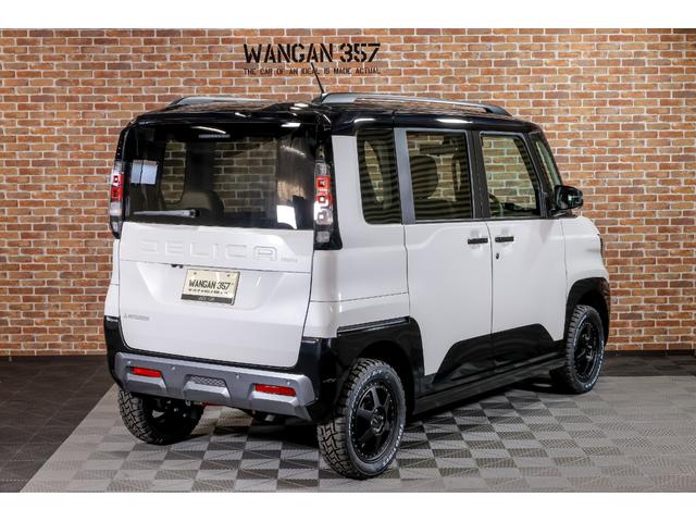 デリカミニ T プレミアム デリマルパッケージ WANGAN357リフトアップキット ラテラルロッド 新品装着 純正12.3インチナビゲーション 純正色ホワイトパール ブラックマイカ ツートーン 15インチタイヤホイール(8枚目)