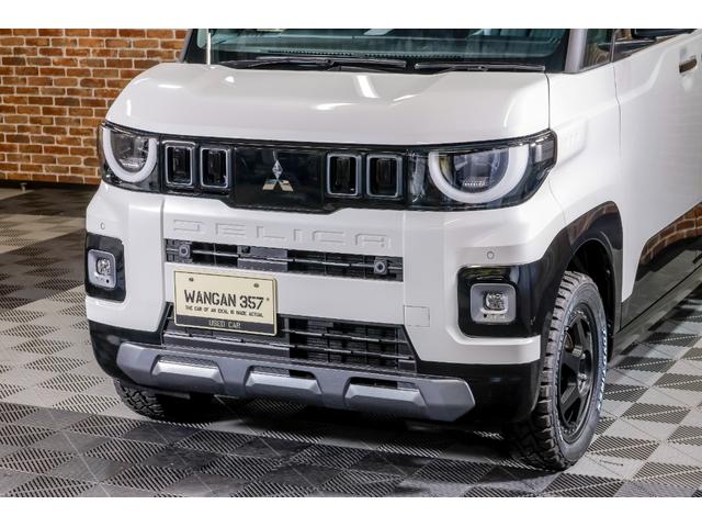 デリカミニ T プレミアム デリマルパッケージ WANGAN357リフトアップキット ラテラルロッド 新品装着 純正12.3インチナビゲーション 純正色ホワイトパール ブラックマイカ ツートーン 15インチタイヤホイール(45枚目)