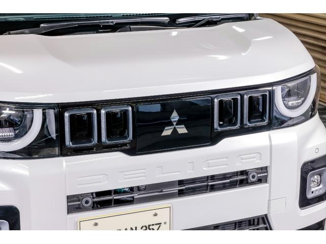 デリカミニ T プレミアム デリマルパッケージ WANGAN357リフトアップキット ラテラルロッド 新品装着 純正12.3インチナビゲーション 純正色ホワイトパール ブラックマイカ ツートーン 15インチタイヤホイール(46枚目)