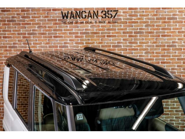 デリカミニ T プレミアム デリマルパッケージ WANGAN357リフトアップキット ラテラルロッド 新品装着 純正12.3インチナビゲーション 純正色ホワイトパール ブラックマイカ ツートーン 15インチタイヤホイール(58枚目)