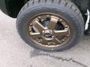 １６５／６５－１５装着でチョイ上げリフトアップ感を出しておりますがスプリングはノーマルです・試乗車ですので純正アルミにはスタッドレスタイヤもついております