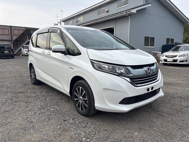 フリードハイブリッド ハイブリッド・Ｇホンダセンシング　４ＷＤ　ドライブレコーダー　ＥＴＣ　バックカメラ　ナビ　ＴＶ　オートクルーズコントロール　レーンアシスト　衝突被害軽減システム　両側電動スライドドア　オートライト　ＬＥＤヘッドランプ　スマートキー（12枚目）