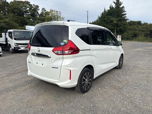 フリードハイブリッド ハイブリッド・Ｇホンダセンシング　４ＷＤ　ドライブレコーダー　ＥＴＣ　バックカメラ　ナビ　ＴＶ　オートクルーズコントロール　レーンアシスト　衝突被害軽減システム　両側電動スライドドア　オートライト　ＬＥＤヘッドランプ　スマートキー（14枚目）