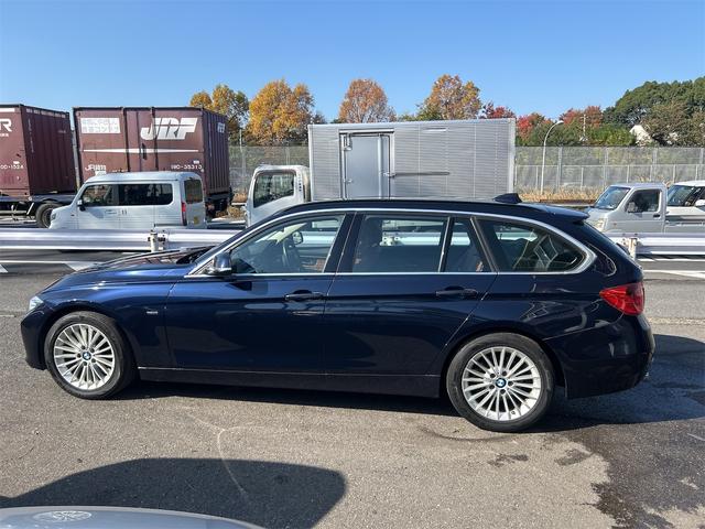 ３シリーズ ３２０ｉツーリング　ポリマーコート済み　ＨＩＤ　ＬＥＤポジション　純正ＨＤＤナビゲーション　ＥＴＣ　バックカメラ　メモリー付き本革パワーシート　シートＨ　プッシュスタート　レグノタイヤ　純正アルミ　禁煙車　スペアキーあり（4枚目）