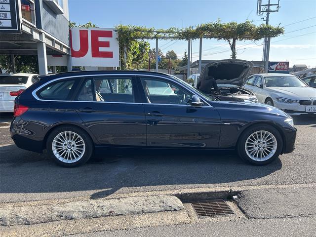 ３シリーズ ３２０ｉツーリング　ポリマーコート済み　ＨＩＤ　ＬＥＤポジション　純正ＨＤＤナビゲーション　ＥＴＣ　バックカメラ　メモリー付き本革パワーシート　シートＨ　プッシュスタート　レグノタイヤ　純正アルミ　禁煙車　スペアキーあり（8枚目）