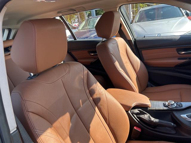 ３シリーズ ３２０ｉツーリング　ポリマーコート済み　ＨＩＤ　ＬＥＤポジション　純正ＨＤＤナビゲーション　ＥＴＣ　バックカメラ　メモリー付き本革パワーシート　シートＨ　プッシュスタート　レグノタイヤ　純正アルミ　禁煙車　スペアキーあり（10枚目）