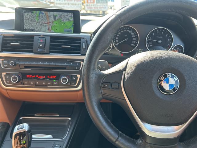 ３シリーズ ３２０ｉツーリング　ポリマーコート済み　ＨＩＤ　ＬＥＤポジション　純正ＨＤＤナビゲーション　ＥＴＣ　バックカメラ　メモリー付き本革パワーシート　シートＨ　プッシュスタート　レグノタイヤ　純正アルミ　禁煙車　スペアキーあり（22枚目）