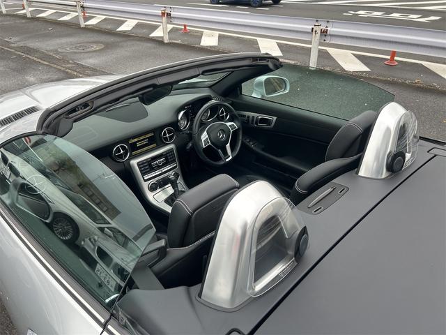 ＳＬＫ 　ＨＩＤヘッドライト　ＬＥＤポジション　純正ＨＤＤナビゲーション　ＥＴＣ　　パークトロ二クス　本革シート　シートヒーター　純正１７インチＡＷ　Ｐシフト　Ｐスタート　カーボンリップ　禁煙車（46枚目）