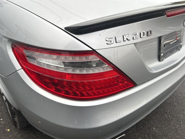 ＳＬＫ 　ＨＩＤヘッドライト　ＬＥＤポジション　純正ＨＤＤナビゲーション　ＥＴＣ　　パークトロ二クス　本革シート　シートヒーター　純正１７インチＡＷ　Ｐシフト　Ｐスタート　カーボンリップ　禁煙車（56枚目）